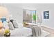 Relaxing bedroom with city views and comfortable decor at 1625 Larimer St # 1806, Denver, CO 80202