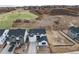 Aerial view of home featuring a front yard, long driveway and neighborhood at 3898 Descent St, Castle Rock, CO 80108