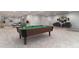 Finished basement including a pool table and seating area at 3898 Descent St, Castle Rock, CO 80108