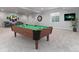 Basement area featuring a pool table, bar area, and large window at 3898 Descent St, Castle Rock, CO 80108