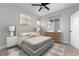 Cozy bedroom with a large window, grey walls, and carpet floors at 3898 Descent St, Castle Rock, CO 80108