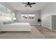 Comfortable bedroom features plush bedding, soft textures, and a tranquil ambiance at 3898 Descent St, Castle Rock, CO 80108