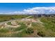 Neighborhood park with a walking path, playground, covered picnic area and expansive neighborhood views at 3898 Descent St, Castle Rock, CO 80108