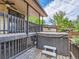 Relax on this back deck with a hot tub and covered area at 6160 Taft Ct, Arvada, CO 80004