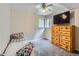 This bedroom offers a comfortable space with a window view and closet at 6160 Taft Ct, Arvada, CO 80004