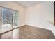 Open-concept dining area with sliding glass doors and seamless granite counter access to the kitchen at 2216 S Nile Ct, Aurora, CO 80014