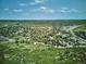 Sweeping aerial view showcases a neighborhood nestled in a lush, green landscape with scenic views at 800 Park View Pl, Castle Rock, CO 80104