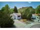 Aerial view of the home showcasing the driveway, landscaping, and surrounding neighborhood at 800 Park View Pl, Castle Rock, CO 80104
