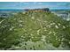 Breathtaking aerial view of a scenic mountain with hiking trails and stunning views of the surrounding landscape at 800 Park View Pl, Castle Rock, CO 80104