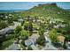 Stunning aerial view featuring lush greenery, mature trees, and residential homes nestled in a desirable location at 800 Park View Pl, Castle Rock, CO 80104