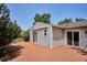 Exterior of house with a wood deck and sliding glass door at 800 Park View Pl, Castle Rock, CO 80104