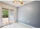 This bedroom has a ceiling fan and access to a private deck at 800 Park View Pl, Castle Rock, CO 80104