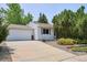 Charming single-story home with a well-maintained front yard and attached garage at 800 Park View Pl, Castle Rock, CO 80104