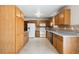 Functional kitchen offering plenty of counter space and storage in wood cabinets at 800 Park View Pl, Castle Rock, CO 80104