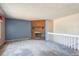 Spacious living room with carpet, a brick fireplace, and plenty of natural light at 800 Park View Pl, Castle Rock, CO 80104