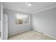 Simple dining area with tile floors and window at 1628 Chester St, Aurora, CO 80010