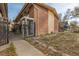 Brick building exterior with walkway at 1628 Chester St, Aurora, CO 80010