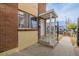 Front entrance of brick building, featuring a covered entryway and walkway at 1628 Chester St, Aurora, CO 80010