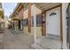 Building exterior showcasing multiple entrances and a shared walkway at 1628 Chester St, Aurora, CO 80010