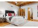 Bright bedroom featuring a comfortable bed and ample closet space at 2955 Inca St # 1D, Denver, CO 80202