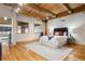 Spacious bedroom with hardwood floors and modern art at 2955 Inca St # 1D, Denver, CO 80202