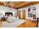 Bright bedroom with hardwood floors and a large window at 2955 Inca St # 1D, Denver, CO 80202