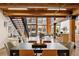 Open concept dining area with contemporary table and chairs at 2955 Inca St # 1D, Denver, CO 80202