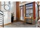 Modern entryway with glass door and sleek console table at 2955 Inca St # 1D, Denver, CO 80202