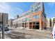 Modern building exterior with parking and street view at 2955 Inca St # 1D, Denver, CO 80202