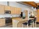 Modern kitchen with stainless steel appliances and an island at 2955 Inca St # 1D, Denver, CO 80202