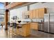 Updated kitchen boasting stainless steel appliances and light wood cabinetry at 2955 Inca St # 1D, Denver, CO 80202