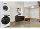 Modern laundry room with stackable washer and dryer at 2955 Inca St # 1D, Denver, CO 80202