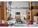 Spacious living room featuring high ceilings, large windows, and a stylish sitting area at 2955 Inca St # 1D, Denver, CO 80202