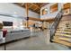 Spacious living area with high ceilings and exposed beams at 2955 Inca St # 1D, Denver, CO 80202