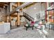 Spacious loft living area with exposed beams and large windows at 2955 Inca St # 1D, Denver, CO 80202