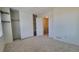 Bedroom with a closet and view to a stairway at 10810 Summerset Way, Parker, CO 80138