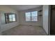 Bedroom featuring a large window, closet, and full-length mirror for added space at 10810 Summerset Way, Parker, CO 80138