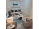 Cozy living room with comfortable seating, a coffee table, and bright decor at 10810 Summerset Way, Parker, CO 80138