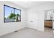 Bedroom with closet and ensuite bath at 2478 S Cherokee St, Denver, CO 80223