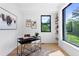 Modern home office with a large window providing natural light and outdoor views at 2478 S Cherokee St, Denver, CO 80223