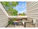 Cozy balcony with wicker furniture and scenic views at 8701 Huron St # 211, Thornton, CO 80260