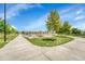 Community playground with lush green space and walking paths at 8701 Huron St # 211, Thornton, CO 80260