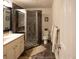 Clean basement bathroom with shower and modern vanity at 4236 Lark Sparrow St, Highlands Ranch, CO 80126