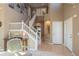 Spacious entryway with a staircase and tiled floor at 4236 Lark Sparrow St, Highlands Ranch, CO 80126