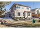 Two-story house exterior with backyard and patio at 4236 Lark Sparrow St, Highlands Ranch, CO 80126