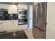 Stainless steel appliances in a well-lit kitchen at 4236 Lark Sparrow St, Highlands Ranch, CO 80126