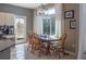 Kitchen nook with a table and chairs near a sliding door at 4236 Lark Sparrow St, Highlands Ranch, CO 80126