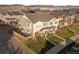 Aerial view showcasing townhome with backyard and neighborhood at 3061 Low Meadow Blvd, Castle Rock, CO 80109