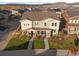 Aerial view of two-story townhome in a neighborhood setting at 3061 Low Meadow Blvd, Castle Rock, CO 80109