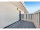 Private patio with brick flooring and wrought iron gate at 3257 S Pontiac St, Denver, CO 80224